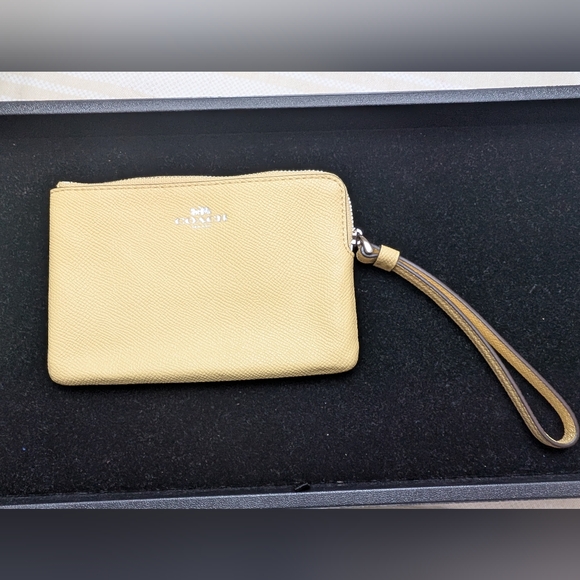 Coach Handbags - Coach Yellow Leather Wristlet